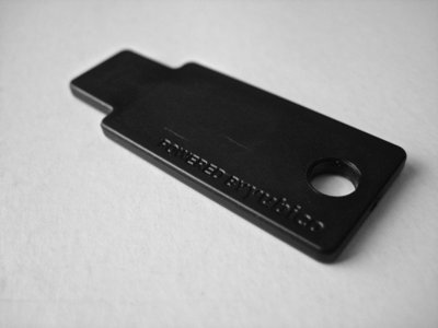 Black YubiKey 5 NFC style USB-A key (item type photo)