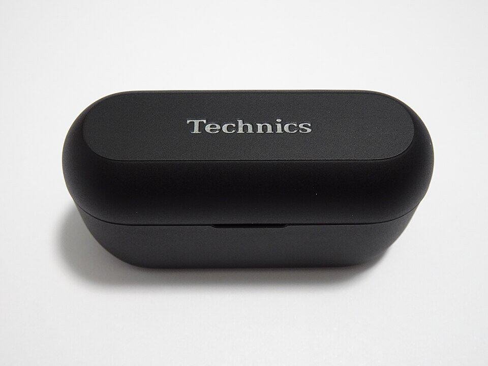 Wireless earbuds in an open charging case (item type photo, not the exact product)