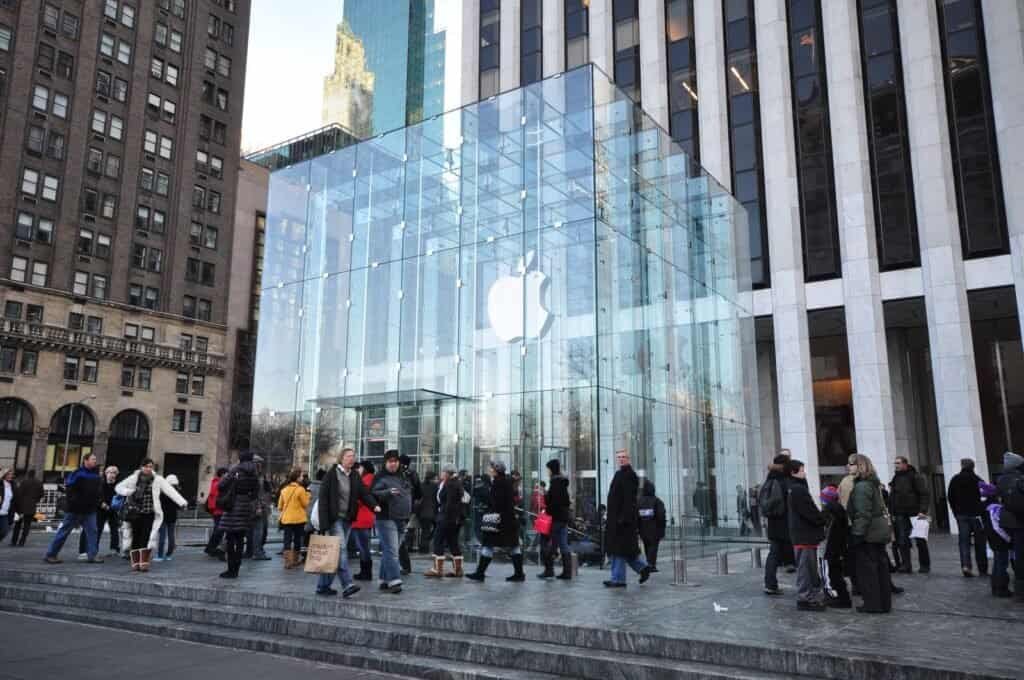 Shoppers outside the glass cube entrance of Apple's Fifth Avenue store in New York