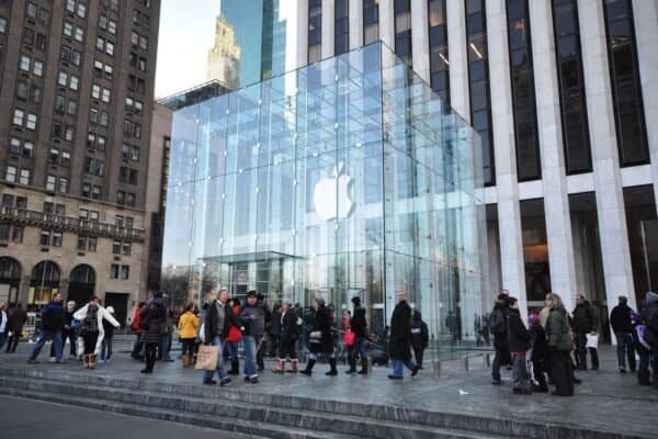 Shoppers outside the glass cube entrance of Apple's Fifth Avenue store in New York
