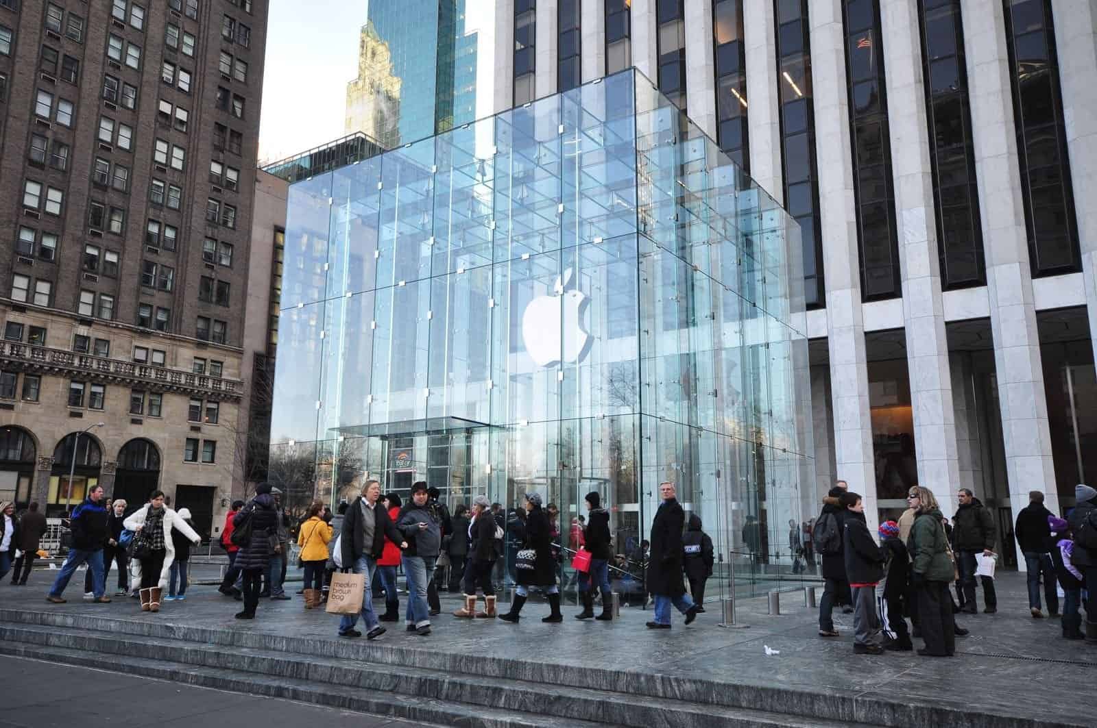 Shoppers outside the glass cube entrance of Apple's Fifth Avenue store in New York