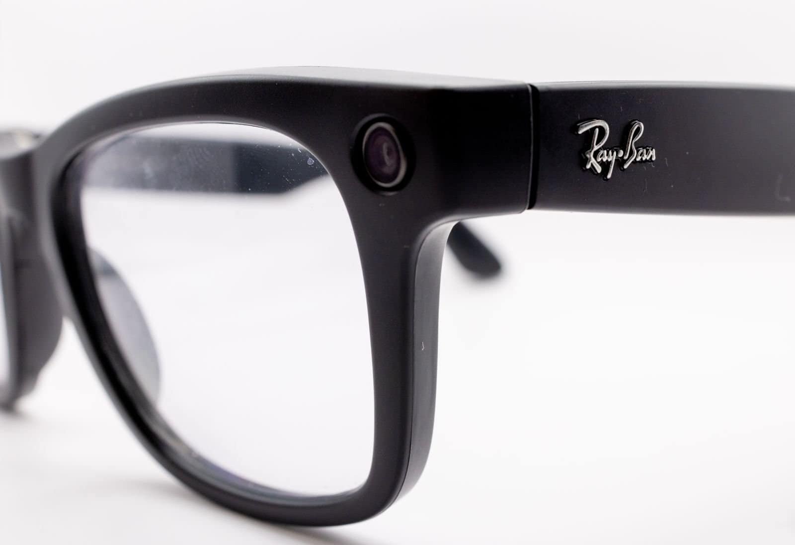 Close-up of black Ray-Ban Meta smart glasses showing the built-in camera